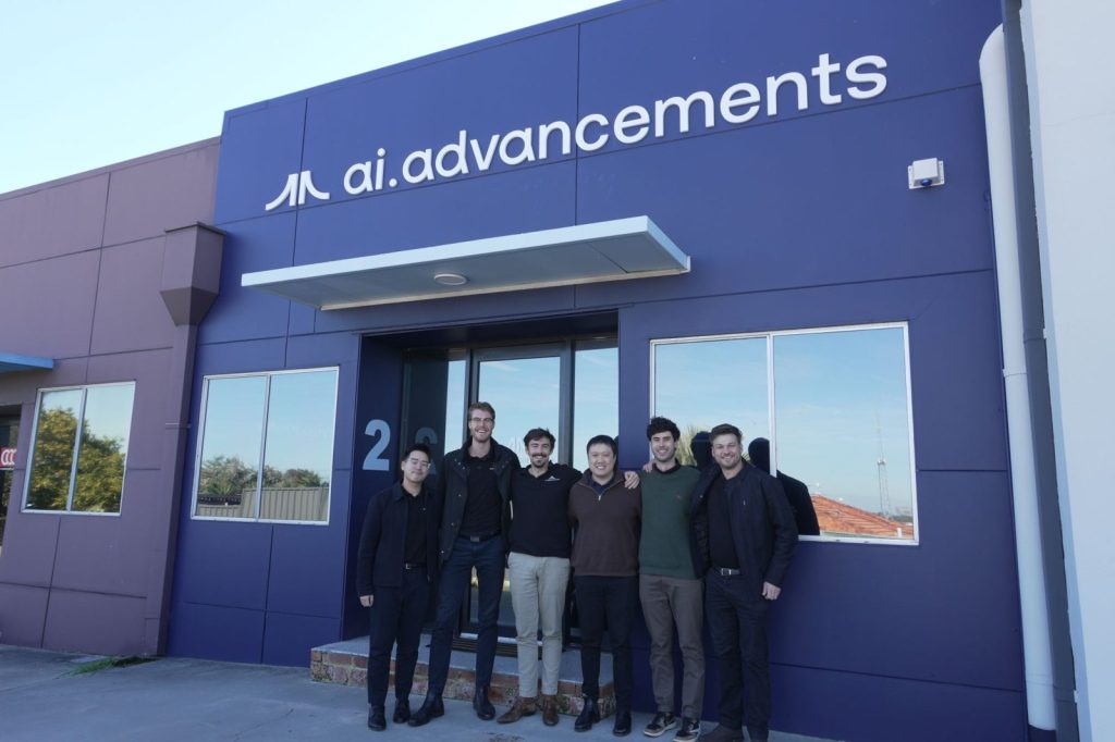 The AI Advancements team outside their office